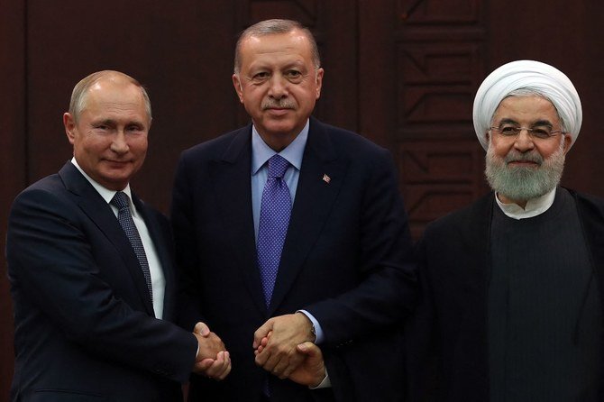 From left: Russian president Vladimir Putin, Turkish president Tayyip Erdogan and Iranian president Hassan Rouhani following a trilateral meeting in Ankara on Sept. 16, 2019. (AFP)