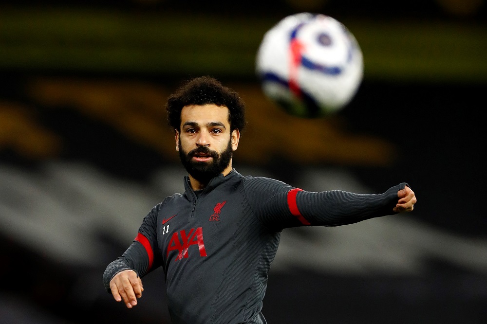 Egypt coach Shawky Gharib told AFP on Thursday that Liverpool striker Mohamed Salah (above) was ready to add significant weight behind the country's quest for a first ever Olympic football medal in Tokyo. (AFP/file)
