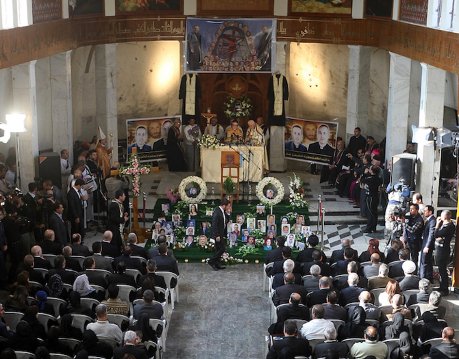 Iraqi Christians gather at the Sayidat Al-Nejat (Our Lady of Salvation) church in Baghdad on December 10, 2010. (AFP/File Photo)