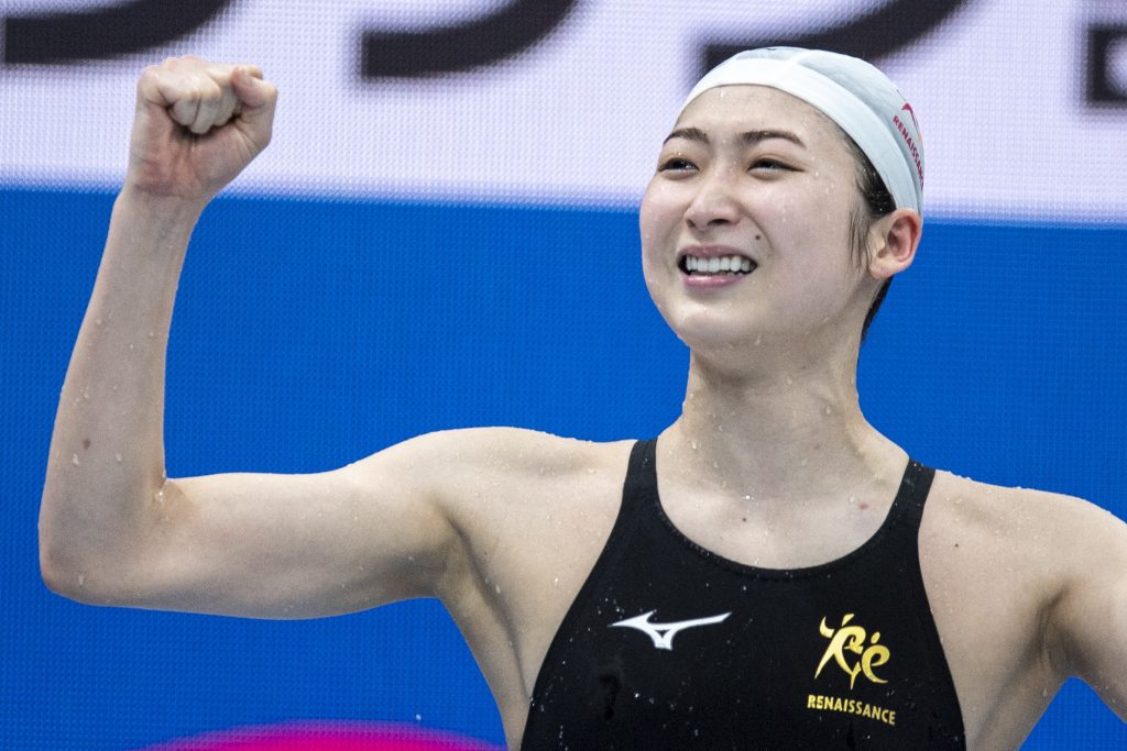 This picture taken taken on April 4, 2021 shows Japanese swimmer Rikako Ikee reacting after winning the 100m butterfly final during the Japan National Swimming Championships