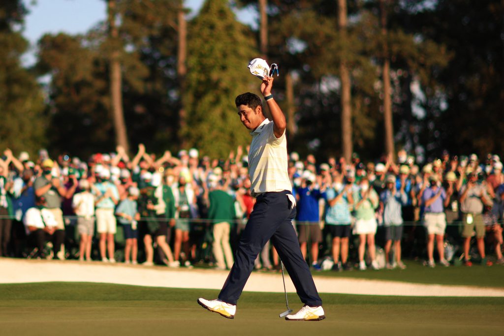 Hideki Matsuyama of Japan celebrates on the 18th green after winning the Masters at Augusta National Golf Club on April 11, 2021 in Augusta, Georgia. (AFP)