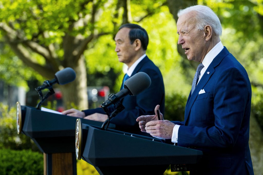 US President Joe Biden (R) and Prime Minister Yoshihide Suga of Japan hold a news conference in the Rose Garden of the White House in Washington, April 16, 2021. (AFP)