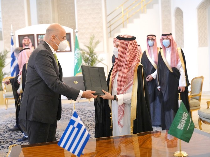 Saudi Foreign Minister Prince Faisal bin Farhan meets his Greek counterpart Nikos Dendias and Greece’s Minister of National Defense Nikolaos Panagiotopoulos. (Twitter/@GreeceMFA)