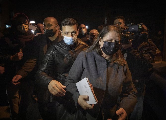 Marwan Barghouti’s wife, Fadwa, leaves the Palestinian Central Election Commission office after registering her husband’s list for the upcoming parliamentary election in May, in Ramallah on March 31, 2021. (AP) 