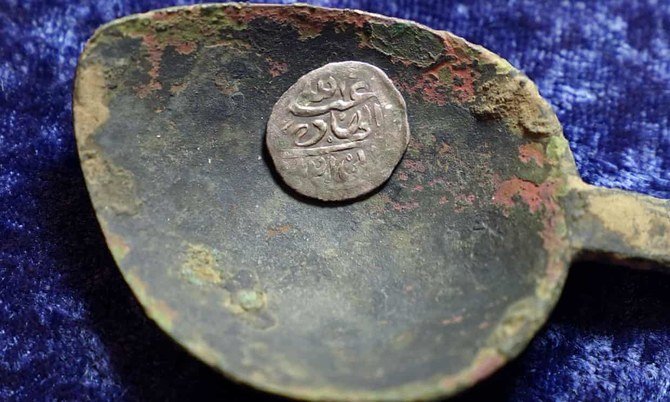 A 17th-century Arabian silver coin that research shows was struck in 1693 in Yemen. (AP Photo)