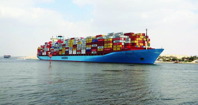 A container ship sails through the Suez Canal in Ismailia. (Reuters)