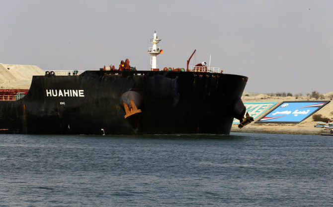 A ship is seen after sailing through Suez Canal as traffic resumes after a container ship that blocked the waterway was refloated. (Reuters)