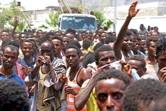 African migrants receive food and water inside a football stadium in the Red Sea port city of Aden in Yemen, on April 23, 2019. (AFP/File Photo)