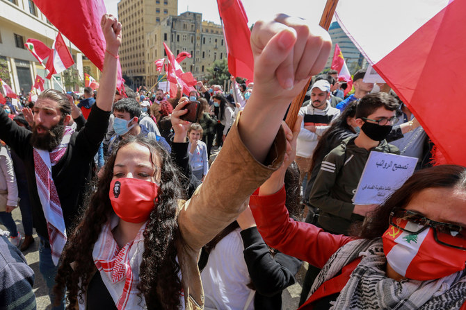 Demonstrators take part in a protest against mounting economic hardships in Beirut, Lebanon, March 28, 2021. (Reuters)