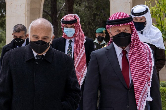 A handout picture released by the Jordanian Royal Palace on April 11, 2021 shows Jordanian King Abdullah II (R), Prince Hassan Bin Talal (L) and Prince Hamzah (C) arriving at the Raghadan Palace in the capital Jordan. (File/AFP)