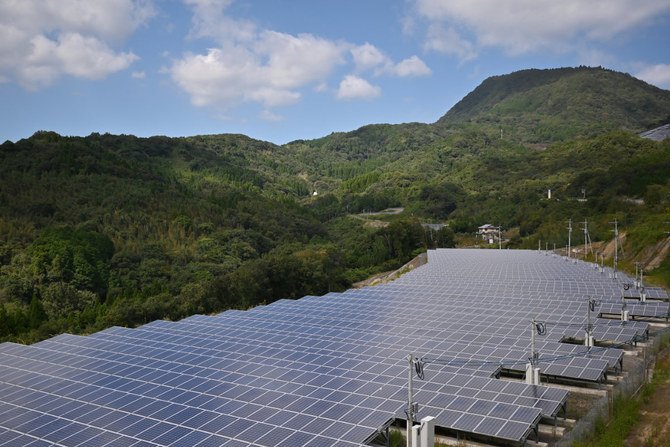 Solar panels are pictured in Yufu, Oita prefecture on October 14, 2019. (Photo by Charly Triballeau / AFP)
