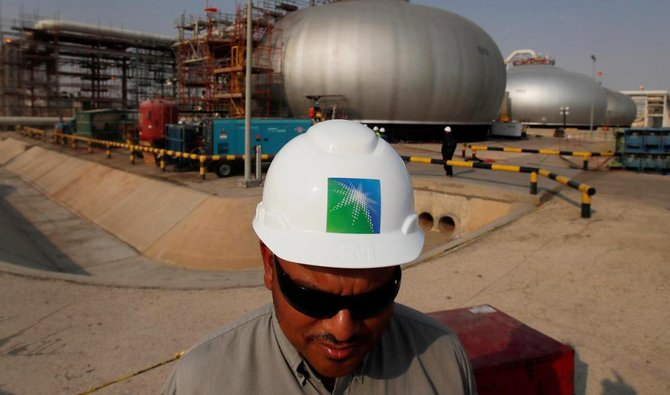 A Saudi Aramco employee is seen at its oil facility in Abqaiq, Saudi Arabia. (Reuters)
