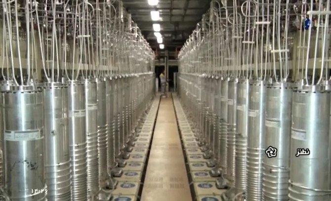 Above, various centrifuge machines line the hall damaged on April 11, 2021, at the Natanz Uranium Enrichment Facility. (Islamic Republic Iran Broadcasting via AP)