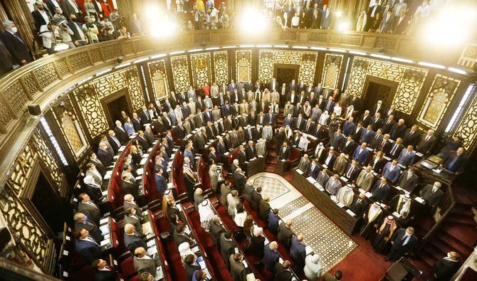 Members of the Syrian parliament meet to discuss upcoming presidential election, in the capital Damascus, on April 18, 2021. (AFP)