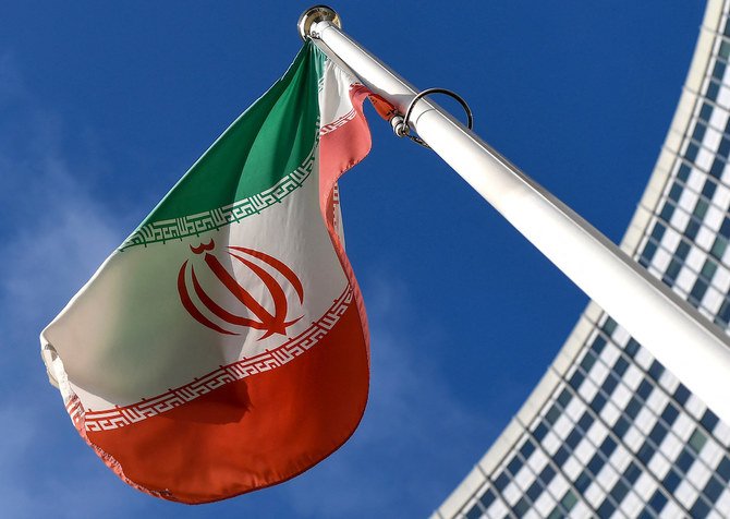 The Iranian national flag is seen outside the International Atomic Energy Agency (IAEA) headquarters during the agency’s Board of Governors meeting in Vienna. (File/AFP)