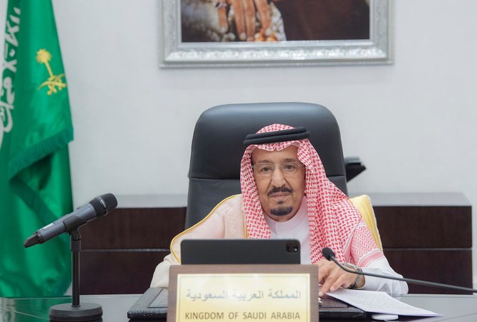 King Salman speaking at the virtual summit. (Photo: Bandar Galoud)