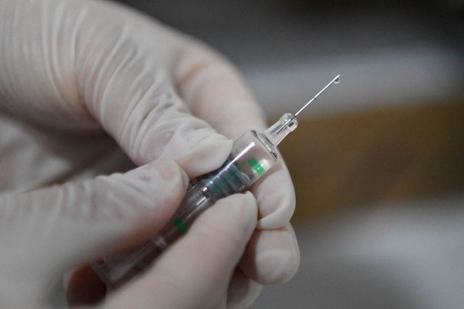 Five million doses of the Sinovac COVID-19 vaccine will be produced within two months at the factories of Vacsera. (File/AFP)
