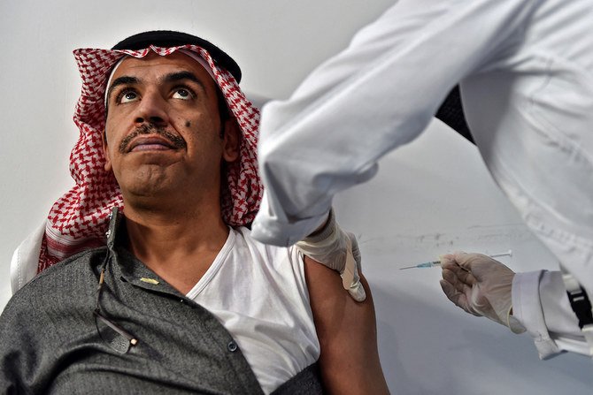 A nurse administers a dose of vaccine against COVID-19 at the Riyadh International Convention and Exhibition Center in the Saudi capital Riyadh, on January 21, 2021. (AFP/File Photo)