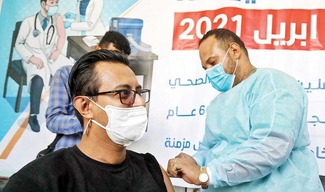 A health worker receives a dose of the AstraZeneca vaccine in Taez. (File/AFP)