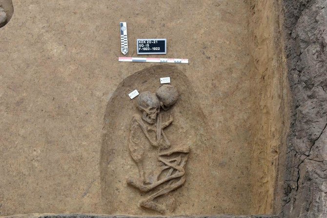 This photo shows an ancient burial tomb unearthed recently with human remains, in the Koum el-Khulgan archeological site. (Egyptian Tourism and Antiquities Ministry via AP)