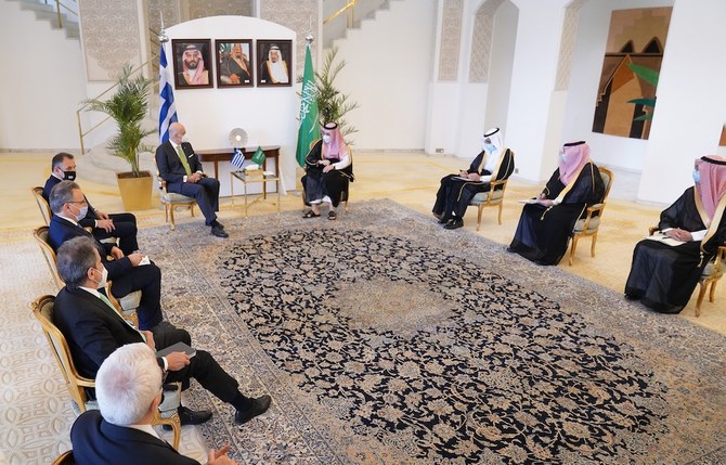 Saudi Foreign Minister Prince Faisal bin Farhan meets his Greek counterpart Nikos Dendias and Greece’s Minister of National Defense Nikolaos Panagiotopoulos. (Twitter/@GreeceMFA)