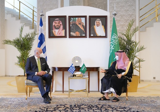 Saudi Foreign Minister Prince Faisal bin Farhan meets his Greek counterpart Nikos Dendias and Greece’s Minister of National Defense Nikolaos Panagiotopoulos. (Twitter/@GreeceMFA)