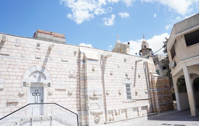 Gaza's Kateb Wilaya mosque, which dates back to the early 14th century CE, and a church stand together. (Supplied)