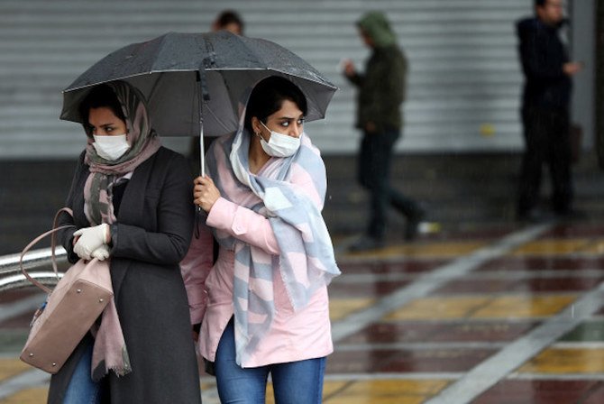Iranian women wear protective masks to prevent contracting coronavirus, Tehran, Iran, February 25, 2020. (Reuters)