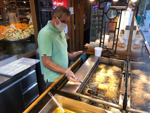 Al Shami Sweets staffer said this Ramadan they’ve been frying few pieces of Kellaj/hour unlike before they fried 15 dozens/hour. (AN photo)