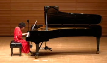 Japanese pianist Muroi Mayako performing a concert in Tokyo, ahead of her hundredth birthday, April. 7, 2021. (Screengrab/NHK)