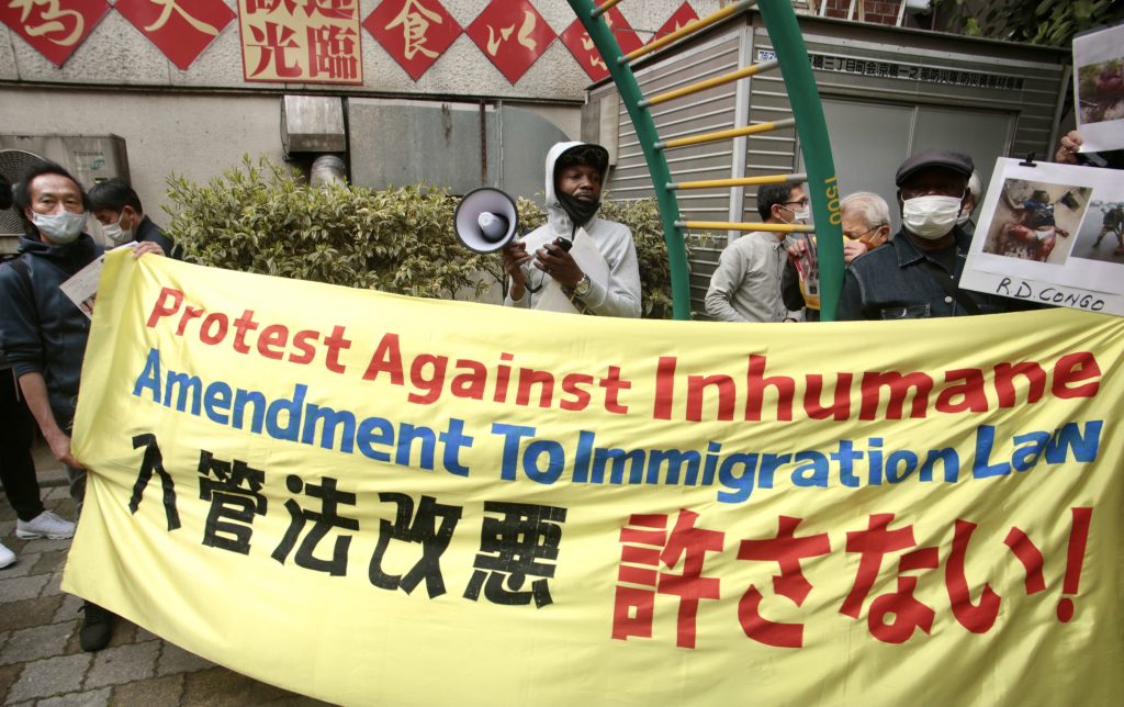 People marching in central Tokyo on Saturday criticizing the proposed immigration bill that the Japanese government plans on passing. (ANJP Photo)