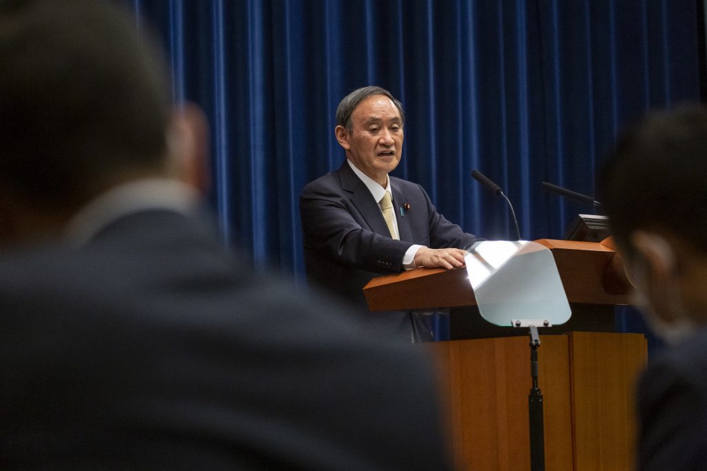 Like many other countries across the globe, Africa has been greatly affected by the spread of the virus, Suga said. (AFP)
