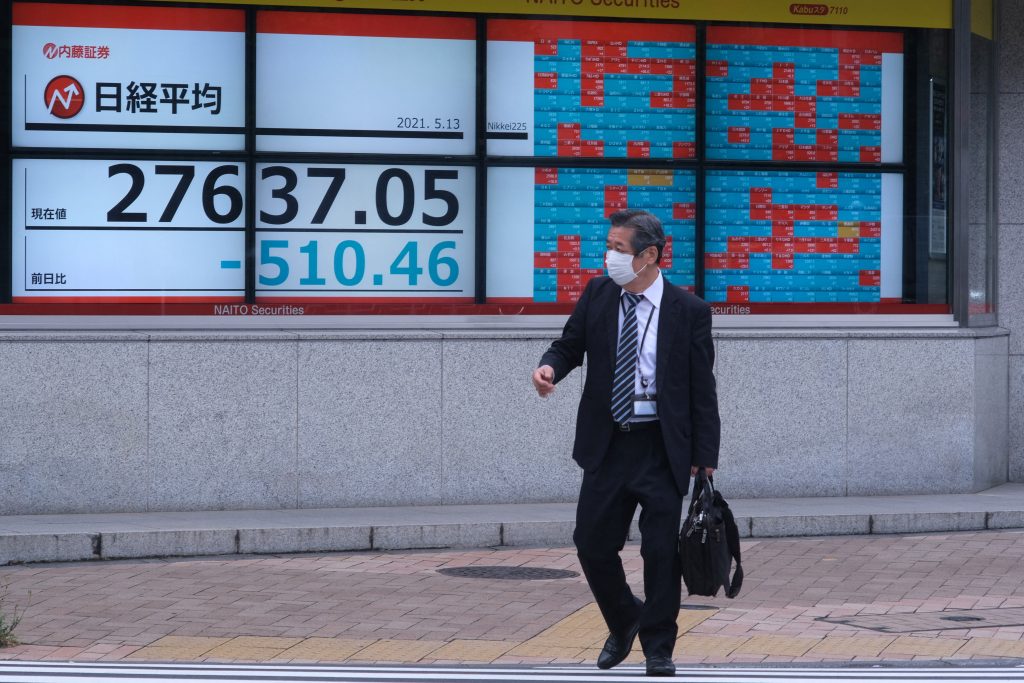 The benchmark Nikkei 225 index fell 0.92 percent, or 259.64 points, to 27,824.83. (AFP)