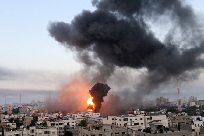 Smoke and flames rise in Gaza during Israeli air attacks, May 12, 2021. (Reuters)