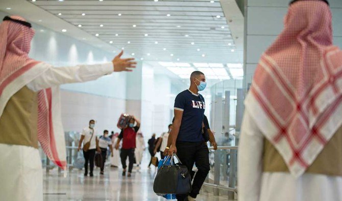 Saudi travelers urged to check quarantine rules abroad before beginning their journey. (AP)