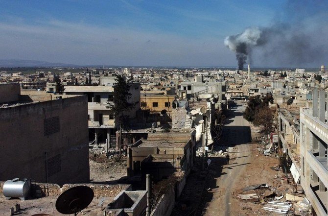 Smoke billows over the town of Saraqib in the eastern part of Idlib province, in northwestern Syria, following bombardment by Assad regime forces, Feb. 27, 2020. (AFP file photo)