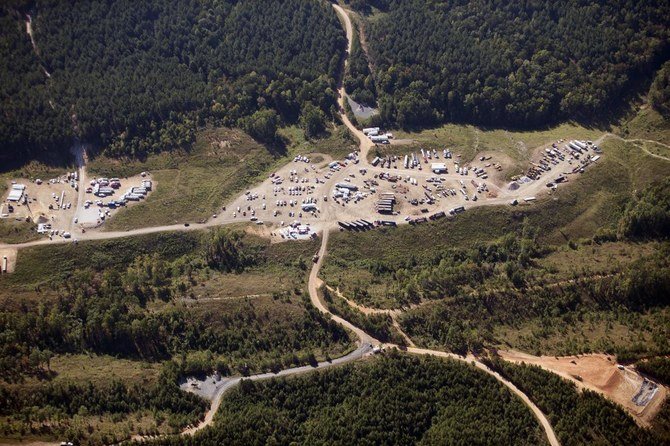 Vehicles are seen near Colonial Pipeline in Alabama, a major pipeline that transports fuels along the East Coast. (AP)