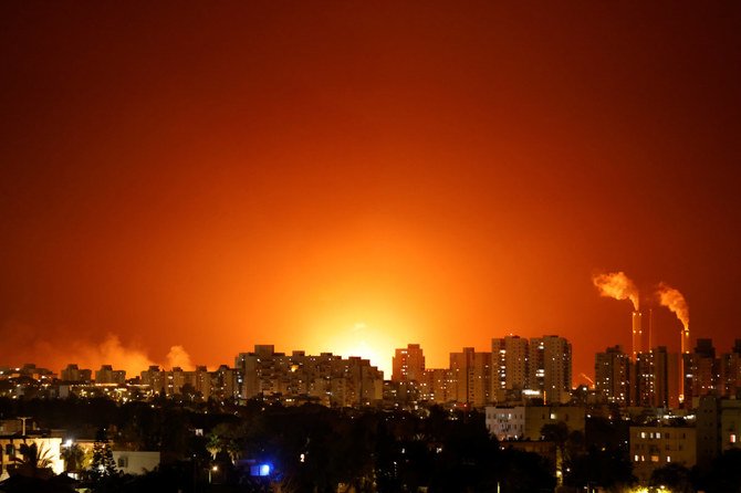 A large fire is seen near the scene of a Hamas rocket attack on an Israeli energy pipeline near Ashkelon, Israel, May 11, 2021. (REUTERS)
