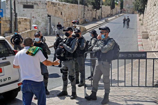 Israeli security forces stand guard in front of the Lion's Gate in Jerusalem to prevent worshippers from reaching the Al-Aqsa mosque compound amid restrictions due to the coronavirus, on September 25, 2020. (AFP file photo)