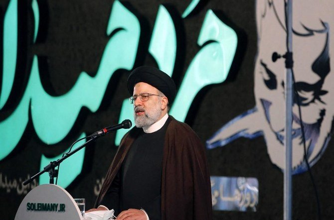 Iranian judiciary chief Ebrahim Raisi speaks during a ceremony on the occasion of the first anniversary of death of former Quds force commander Qasem Soleimani in Tehran, on Jan. 1, 2021. (File/AFP)