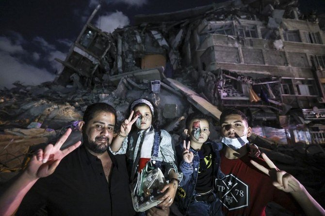 The cease-fire began before dawn on Friday, ending 11 days of cross-border shelling exchanges that caused fresh devastation in the Gaza Strip. (AFP)
