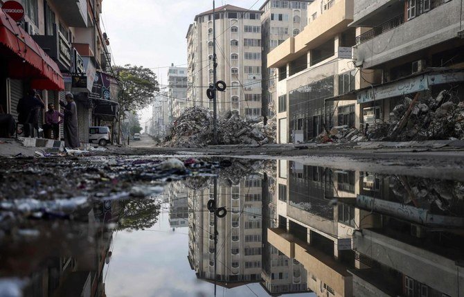 A picture shows a street in Gaza City's Rimal area that was bombed by an Israeli air strike. (File/AFP)