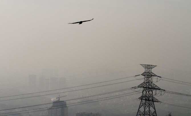 The national grid is overburdened from drought as well as “rising temperature and consumption and a new phenomenon called crypto-currencies,” Iran’s power company said. (AFP)