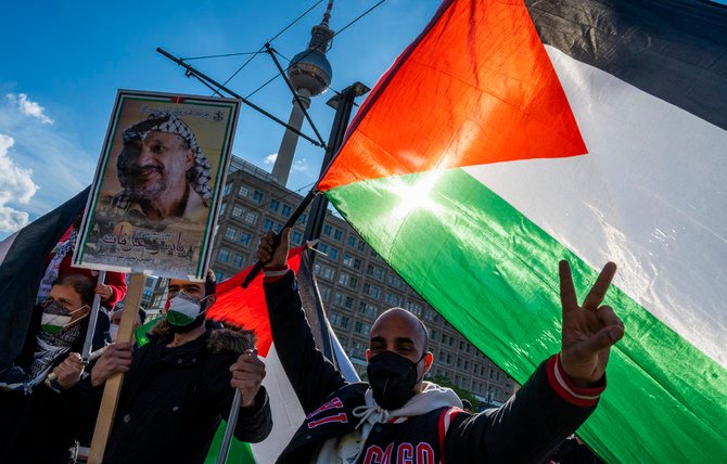Demonstrators march in Berlin on May 19, 2021 in support of the Palestinian cause. (AFP)