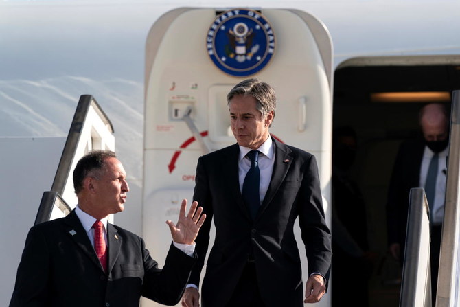 U.S. Secretary of State Antony Blinken talks with Israeli Foreign Minister Gabi Ashkenazi, upon arrival at Tel Aviv May 25, 2021. (Reuters)