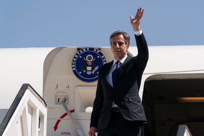 US Secretary of State Antony Blinken waves as he leaves Israel on May 26, 2021 at Ben Gurion Airport following his visit to Israel and Palestinian territories. (AFP)