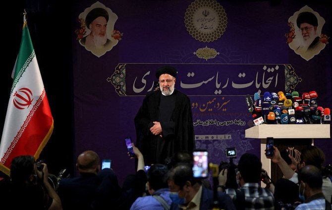 Iranian judiciary chief Ebrahim Raisi arrives to deliver a speech after registering his candidacy for Iran's presidential elections, at the Interior Ministry in capital Tehran, on May 15, 2021. (AFP)