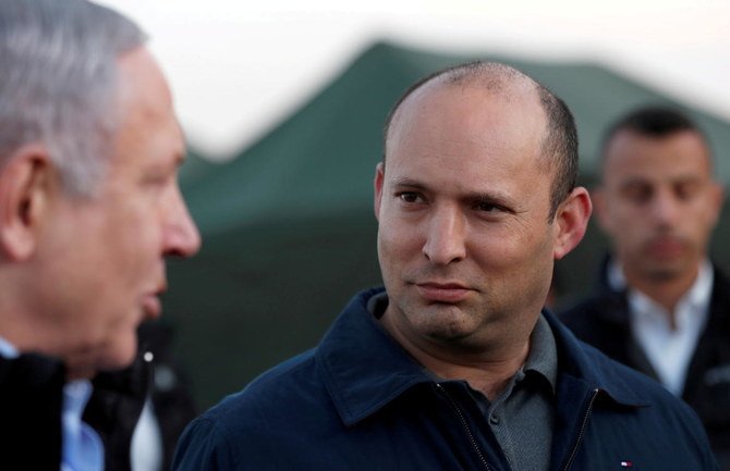 Far-right politician Naftali Bennett, right, whose Yamina party has six key seats in parliament, will be the key whether Prime Minister Benjamin Netanyahu, left, will keep his record run as the country’s leader. (Reuters)