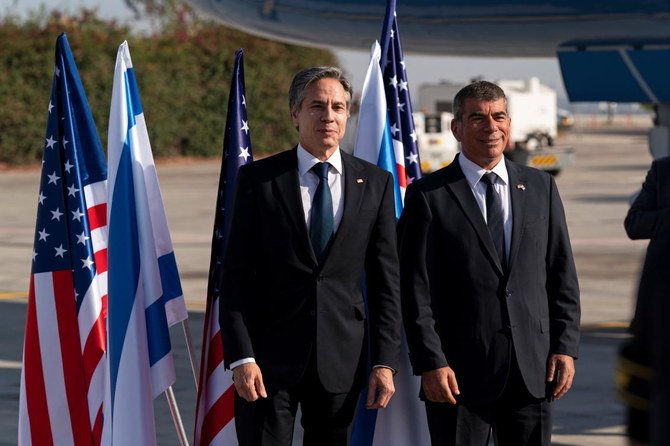 U.S. Secretary of State Antony Blinken talks with Israeli Foreign Minister Gabi Ashkenazi, upon arrival at Tel Aviv Ben Gurion Airport, in Tel Aviv, Israel May 25, 2021. (Reuters)
