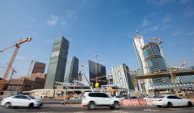 Cars drive past the King Abdullah Financial District in Riyadh. (Reuters)